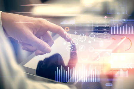 Multi exposure of man's hand holding and using a digital device and data theme drawing. Innovation...