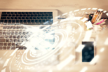 Multi exposure of data drawing hologram over topview of study desk background with computer. Concept of technology.の写真素材
