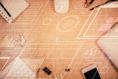 Multi exposure of technology theme drawing over work table desktop. Top view. Global data analysis...