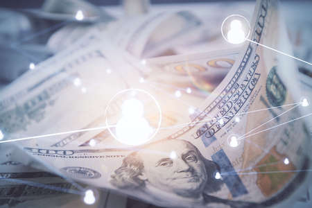 Multi exposure of social network drawing over us dollars bill background. Concept of people...
