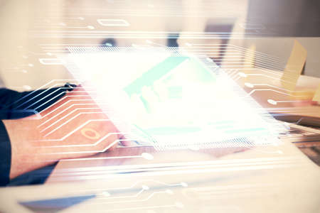 Multi exposure of man's hands holding and using a digital device and data theme drawing. Innovation concept.の写真素材