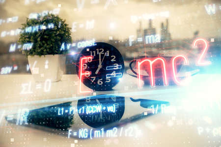 Double exposure of formula drawing and mobile phone background. Concept of education