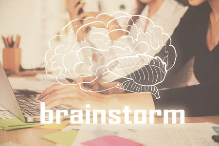 Double exposure of woman hands typing on computer and creative drawing. Start up concept.の写真素材