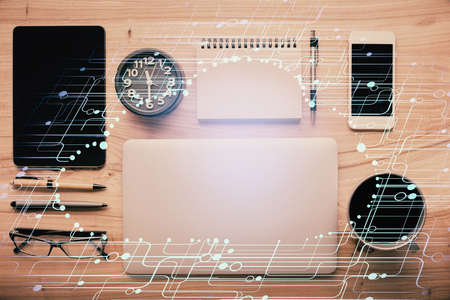 Multi exposure of technology theme drawing over work table desktop. Top view. Global data analysis...