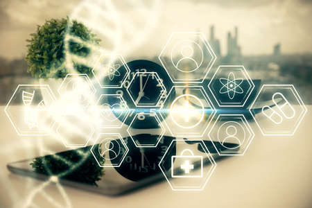 Double exposure of DNA drawing and cell phone background. Concept of medical education
