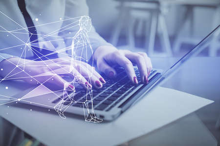 Double exposure of woman hands typing on computer and creative drawing. Start up concept.の写真素材
