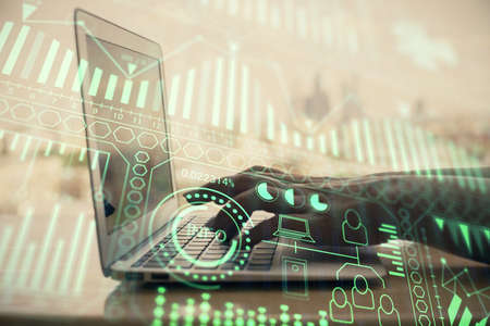 Double exposure of woman hands typing on computer and technology theme drawing. High Tech concept.