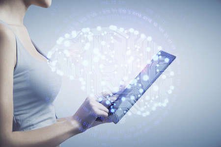 Double exposure of brain sketch hologram and woman holding and using a mobile device.