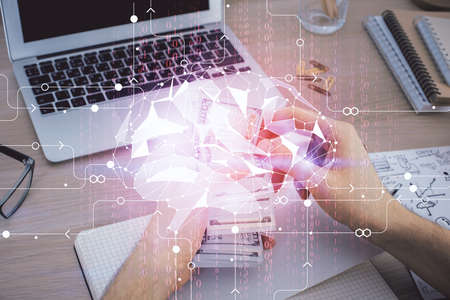 Multi exposure of brain drawing hologram and us dollars bills and man hands. Ai invest concept