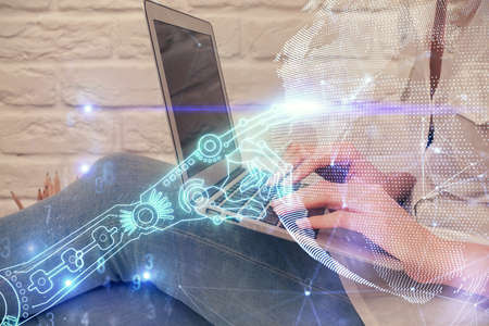 Double exposure of woman hands typing on computer and technology theme drawing. High Tech concept.
