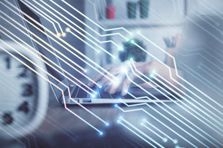 Double exposure of woman hands working on computer and data theme hologram drawing. Tech concept.