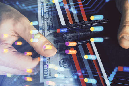 Double exposure of technology drawing hologram and us dollars bills and man hands. Data concept