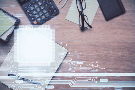 Double exposure of technology theme drawing over work table desktop. Top view. Global data analysis...