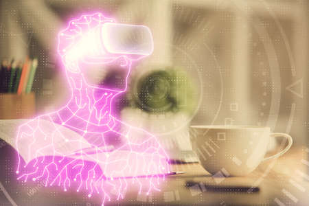 Double exposure of vr glasses drawing and desktop with coffee and items on table background. Concept...