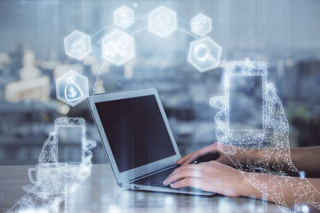 Double exposure of woman hands typing on computer and technology theme drawing. High Tech concept.