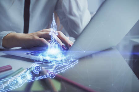 Double exposure of woman hands typing on computer and creative drawing. Start up concept.