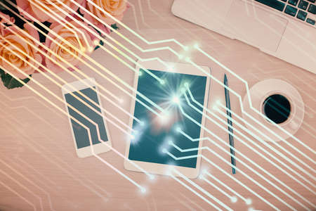 Multi exposure of technology theme drawing over work table desktop.