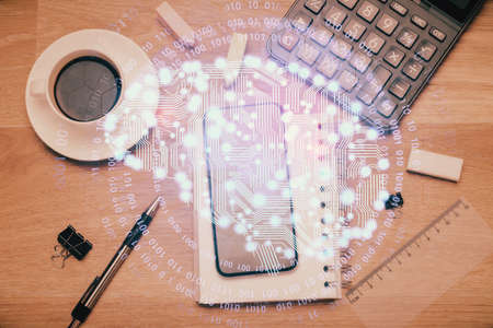 Double exposure of brain drawing over work table desktop.