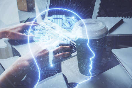 Double exposure of woman hands working on computer and brain hologram drawing. Ai concept.の写真素材