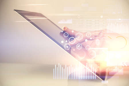 Multi exposure of man's hand holding and using a digital device and data theme drawing. Innovation concept.の写真素材