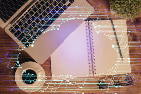 Multi exposure of data theme drawing hologram over topview work desk background with computer....