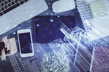 Multi exposure of smart city technology drawing over table with phone. Top view.の写真素材