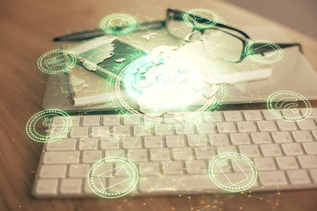 Double exposure of social network theme drawing and cell phone background. Concept of people...