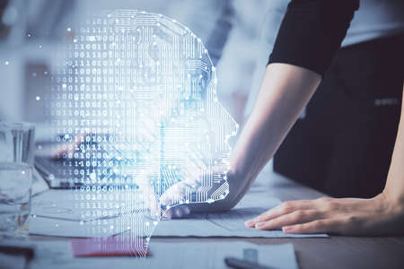 Multi exposure of woman hands working on computer and brain hologram drawing. Ai concept.の写真素材