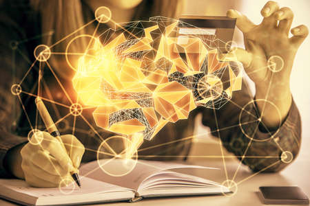 Double exposure of woman on-line shopping holding a credit card and brain hologram drawing. Data E-commerce concept.の写真素材