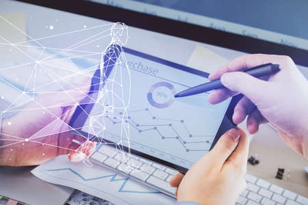 Double exposure of man's hands holding and using a mobile device and creative hologram drawing.