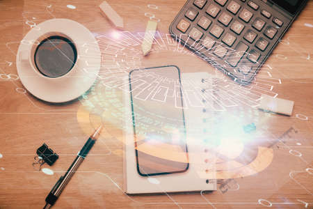 Multi exposure of technology theme drawing over work table desktop. Top view. Global data analysis concept.の写真素材