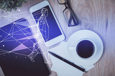 Multi exposure of creative drawing over table with phone. Top view. Concept of startup.の写真素材