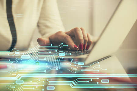 Multi exposure of woman hands working on computer and data theme hologram drawing. Tech concept.