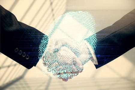 Double exposure of fingerprint hologram and handshake of two men. Security concept.