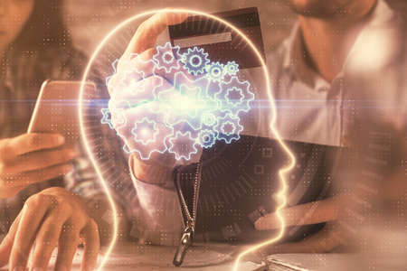 Double exposure of man and woman on-line shopping holding a credit card and brain hologram drawing. Ai and E-commerce pay on-line concept.の写真素材