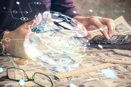 Multi exposure of man's hand holding and using a digital device and data theme drawing. Innovation...