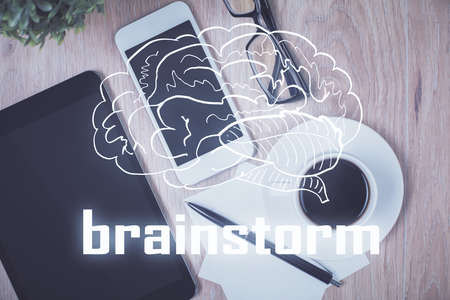 Multi exposure of creative drawing over table with phone. Top view. Concept of startup.の写真素材