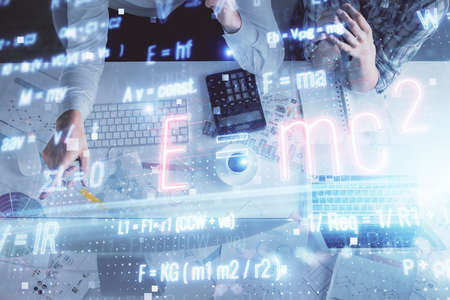 Double exposure of man and woman working together and formula hologram drawing. Computer background....