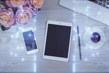 Multi exposure of technology theme drawing over table with phone. Top view. Concept of hightech.の写真素材