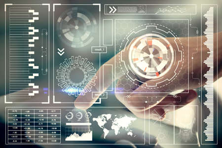 Multi exposure of man's hand holding and using a digital device and data theme drawing. Innovation...
