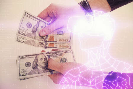 Multi exposure of vr glasses drawing hologram and USA dollars bills and man hands.の写真素材