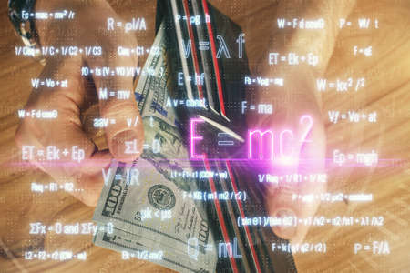 Multi exposure of Formulas drawing hologram and USA dollars bills and man hands. Educationの写真素材