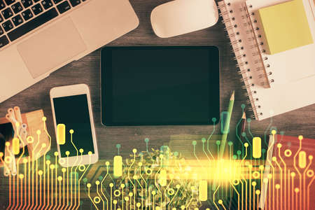 Double exposure of technology theme drawing over work table desktop. Top view. Global data analysis concept.の写真素材