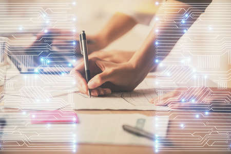 Double exposure of woman hands typing on computer and technology theme drawing. High Tech concept.