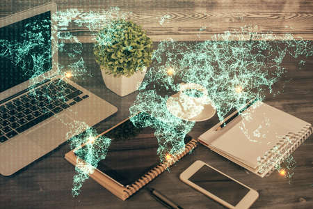 Double exposure of social network theme drawing and cell phone background. Concept of people connection over the worldの写真素材