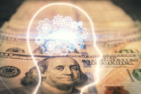 Double exposure of brain drawing over us dollars bill background. Technology concept.の写真素材