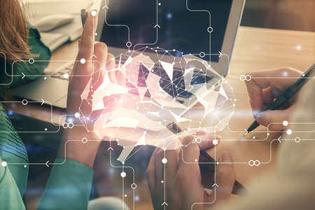 Double exposure of man and woman working together and brain drawing hologram. Intellectual brainstorming concept. Computer background.の写真素材