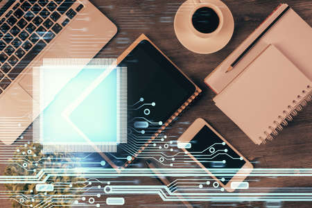 Double exposure of technology theme drawing over work table desktop. Top view. Global data analysis concept.の写真素材