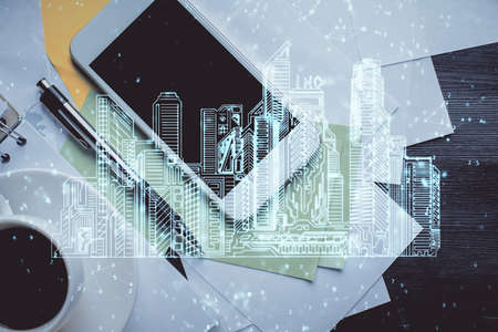 Multi exposure of smart city technology drawing over table with phone. Top view.の写真素材