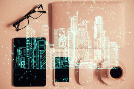 Multi exposure of smart city technology drawing over table with phone. Top view.